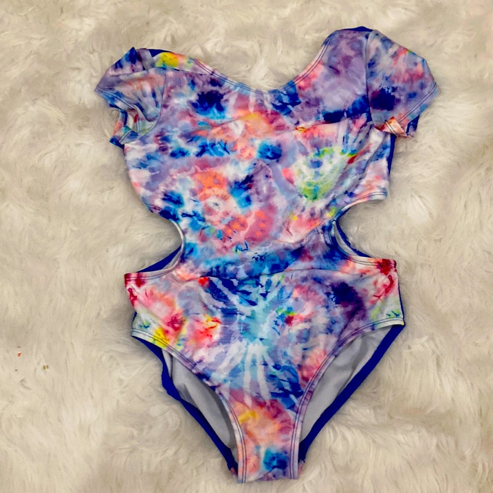 Cute More than Magic tie dye swimsuit with side cuts!